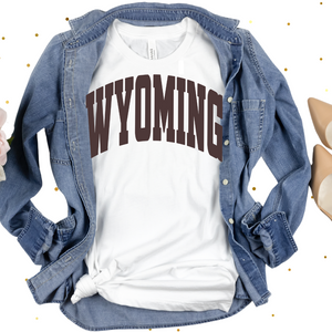 White/Chocolate Varsity WYOMING Bella Canvas Tee